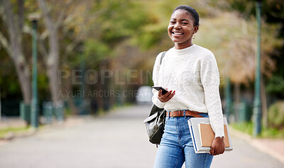 Buy stock photo Portrait, phone and mockup with a student black woman on her commute to university campus for education. Mobile, social media and books with a female college pupil checking for her next lecture
