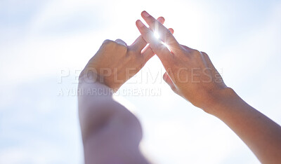 Buy stock photo Person, hand and gesture for sun in blue sky in nature, social media and online sign for creative content creation. Peace, summer vacation and people or hashtag fingers, frame and sunshine light