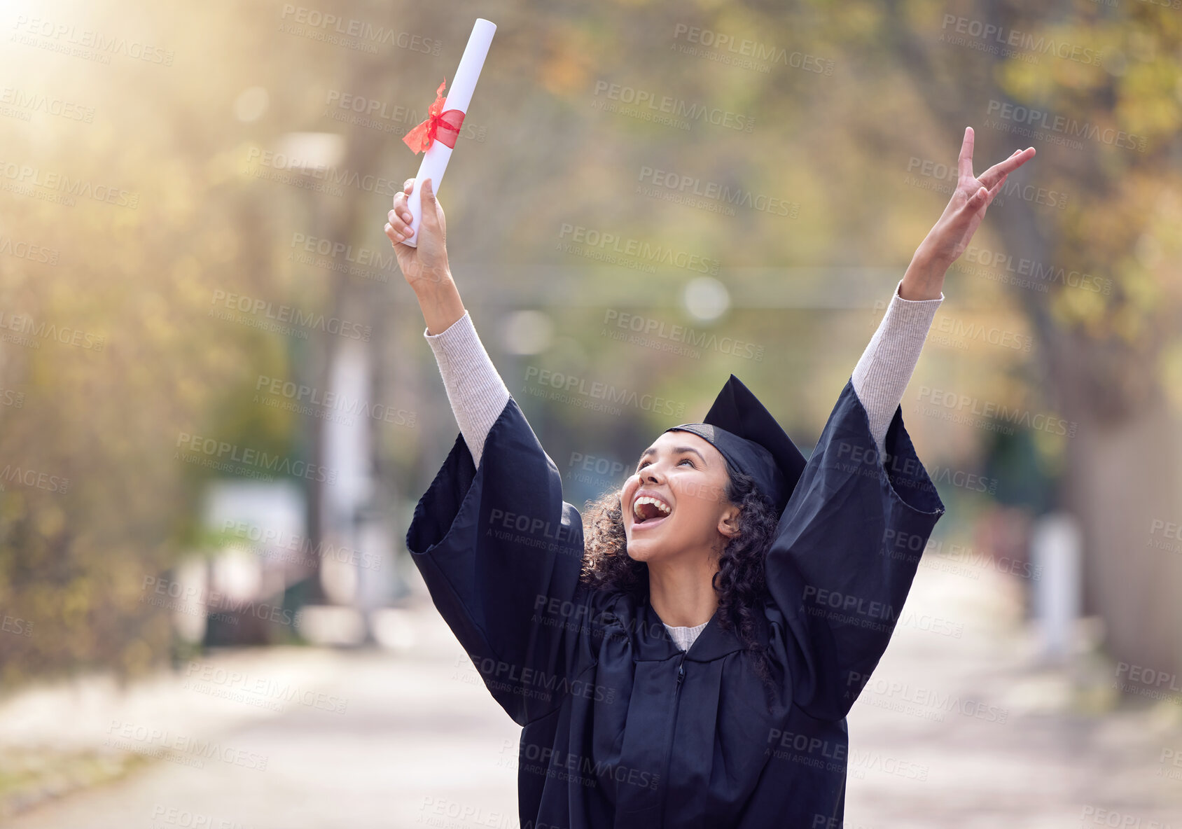 Buy stock photo Success, college student graduate and celebration outdoors with a lens flare. Victory or education, university and happy woman cheering for achievement on her graduation day with certificate 