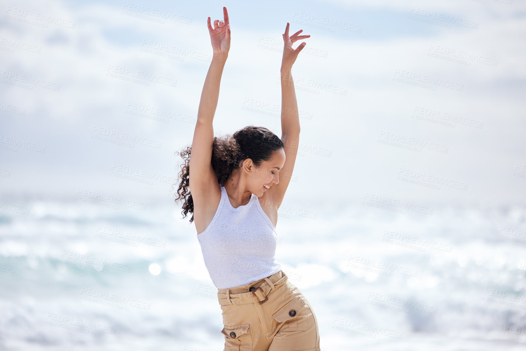 Buy stock photo Woman, freedom and dancing on beach with travel for adventure, celebration and summer vacation on mockup. Person, happy and carefree with energy for holiday fun, enjoyment and entertainment by ocean