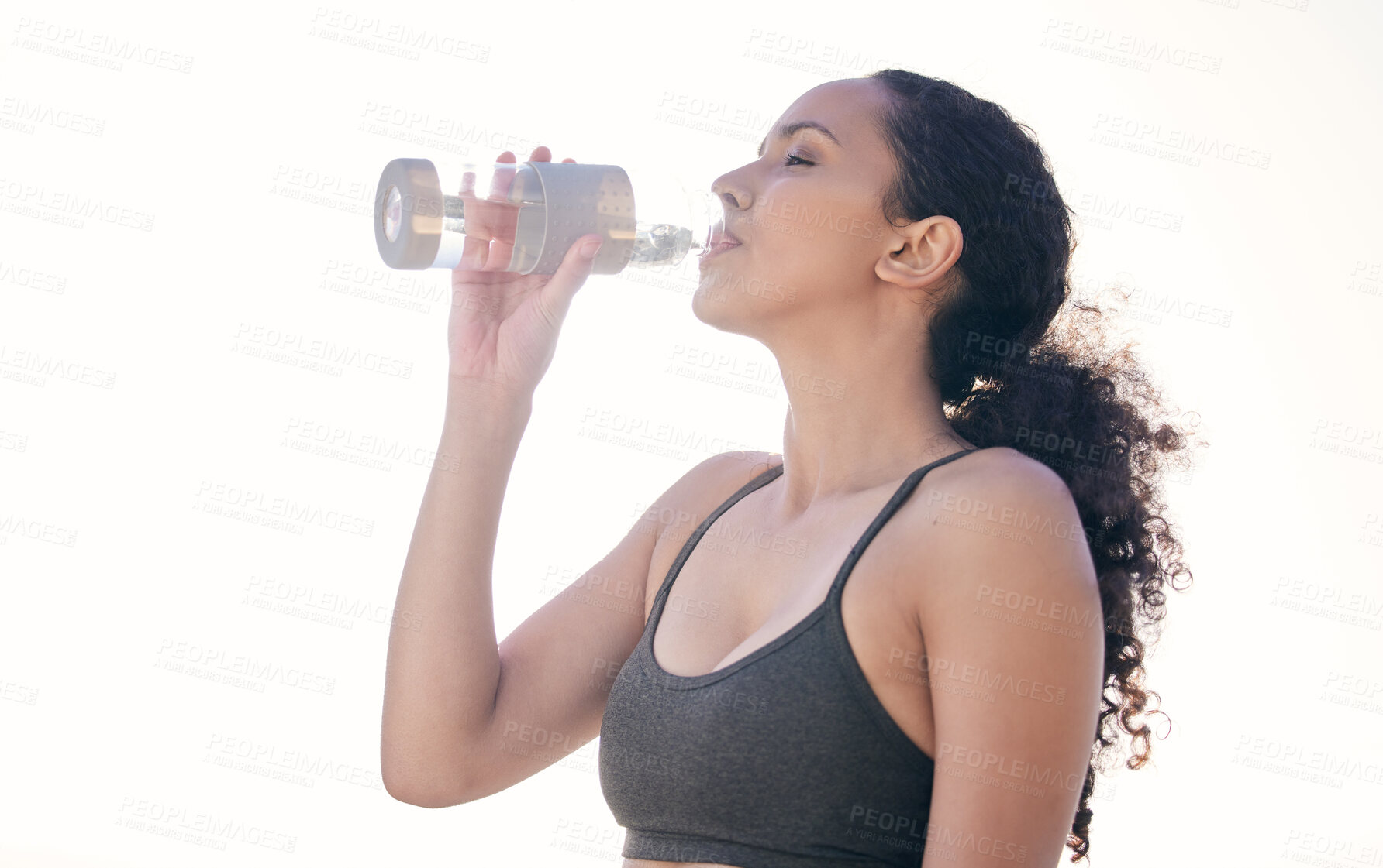 Buy stock photo Studio background, woman and drinking water after yoga for hydration, wellness and health. Female yogini, mineral liquid and H2O as beverage to detox, thirsty and relax for fitness exercise by mockup