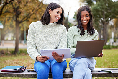 Buy stock photo Shot of two young women studying together at college