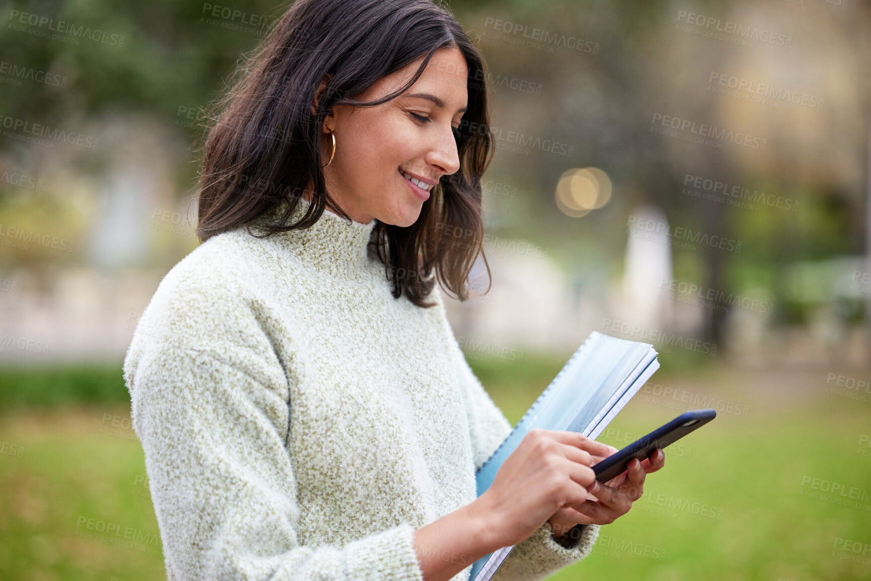 Buy stock photo Student, phone text and woman portrait in a park with learning, research and info on campus. Smile, mobile and university women with notes, social media and college test with a study break outdoor 