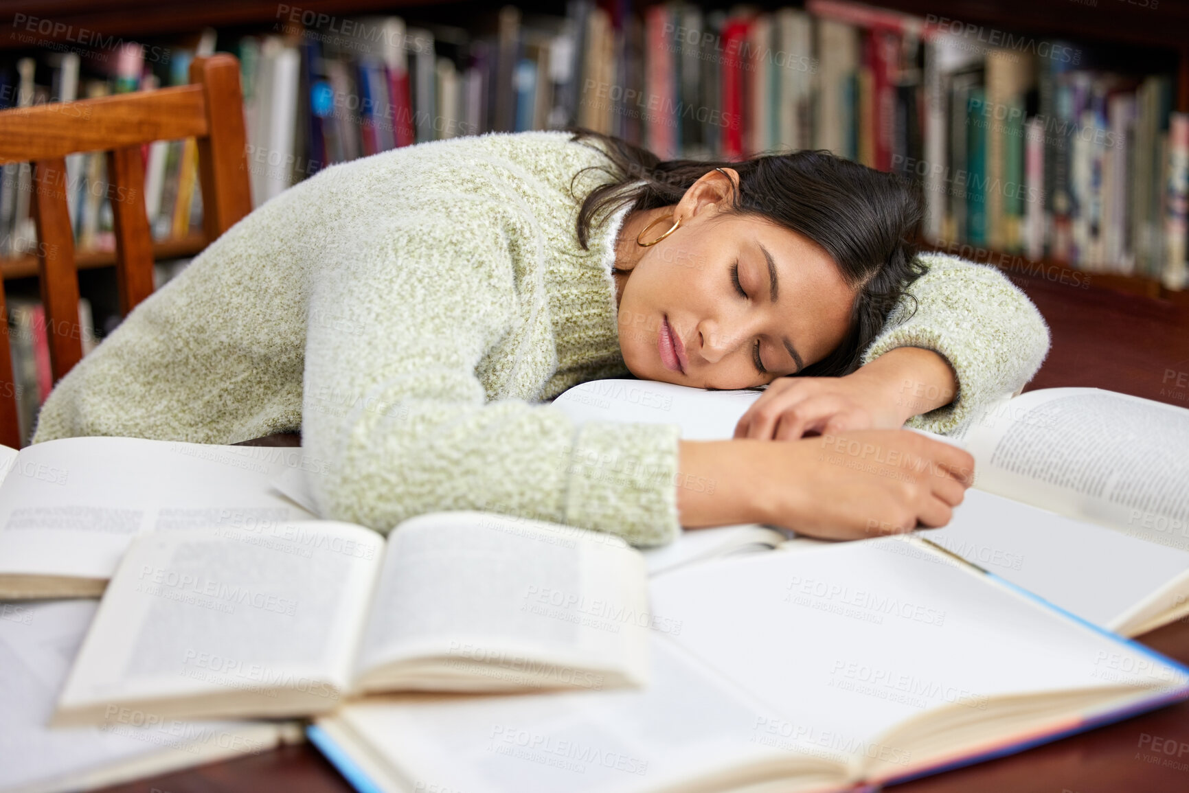 Buy stock photo Student, sleeping woman and library book with study, exam and course research for project at school. University, tired and notes with learning, education and campus with fatigue  for knowledge