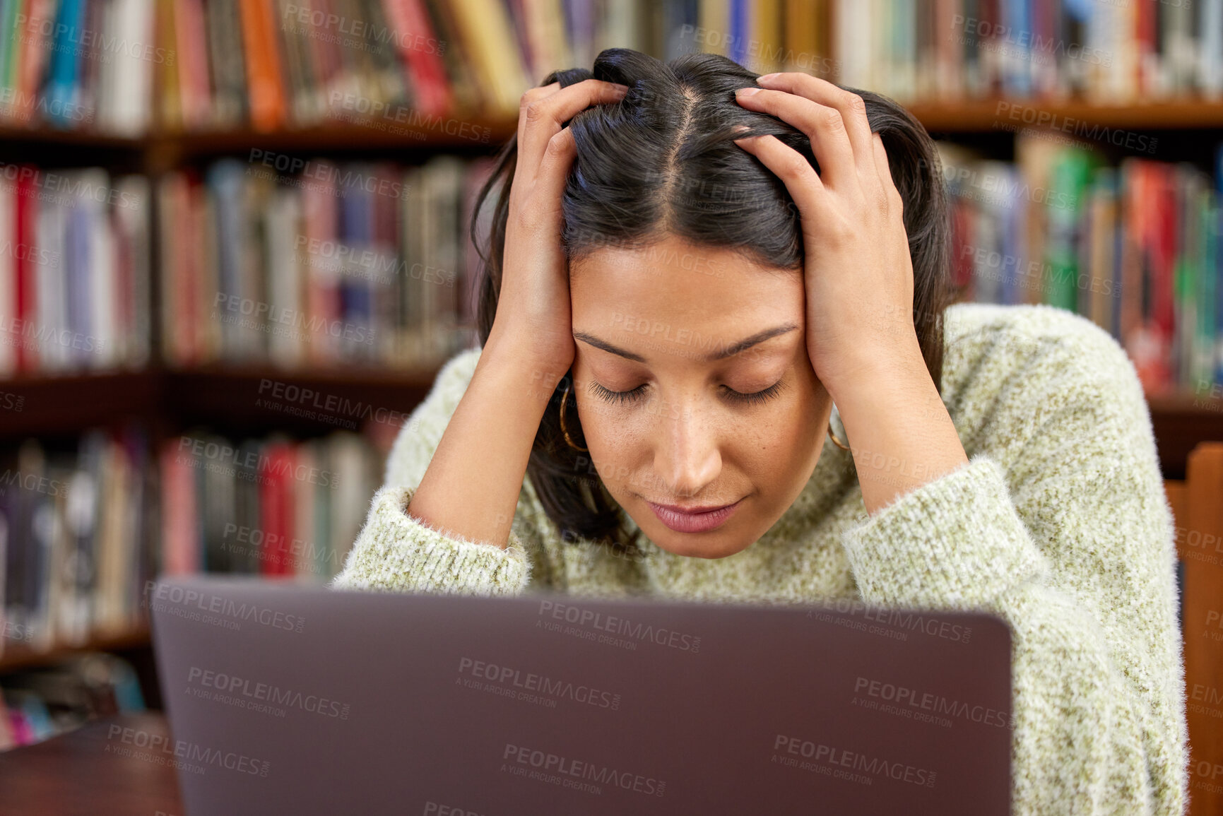 Buy stock photo Library, university and woman on laptop with stress for research, studying and learning. Education, burnout and exhausted student with computer for knowledge, information and project at college