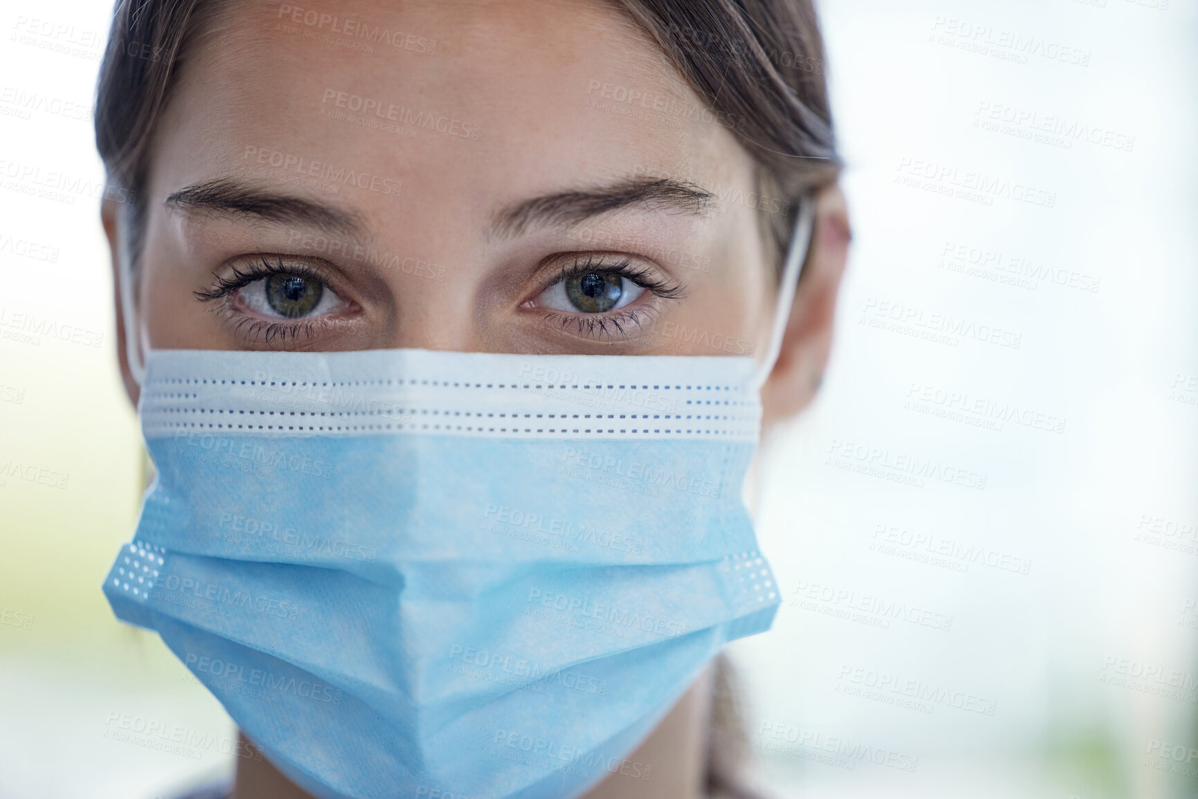 Buy stock photo Portrait of a young woman wearing a face mask in a lab