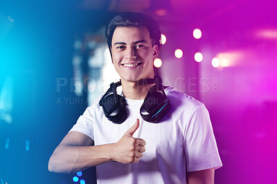 Buy stock photo Shot of a young man showing thumbs up while playing computer games