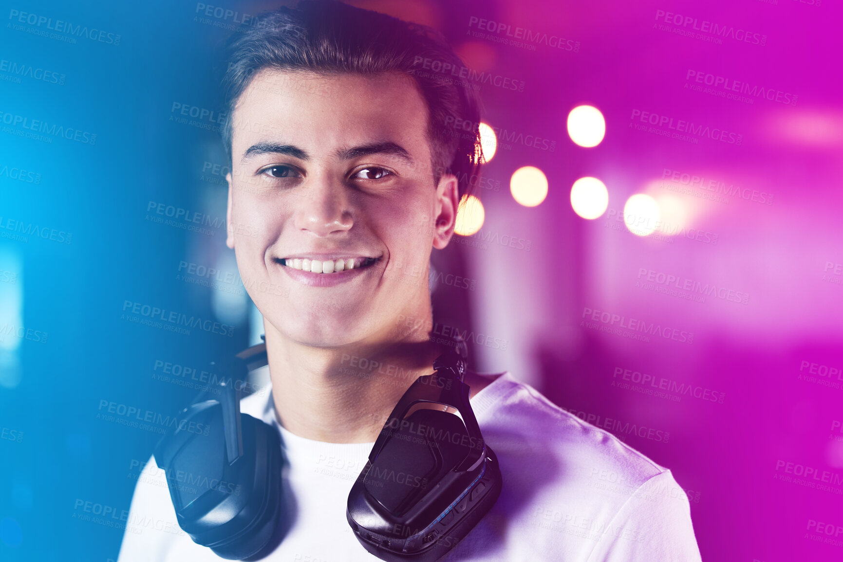 Buy stock photo Portrait, headphones and happy gamer in neon lights, online streaming and competition for esports on internet. Virtual player, video games and streamer with smile, cyber hobby and entertainment