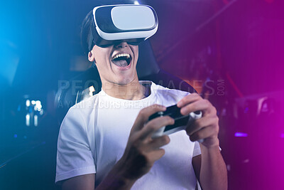 Buy stock photo Shot of a young man using 3d goggles while playing computer games