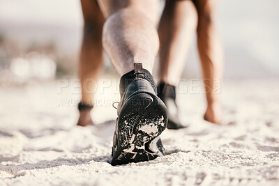 Buy stock photo Rearview shot of a man standing in starting position while out for a run outdoors