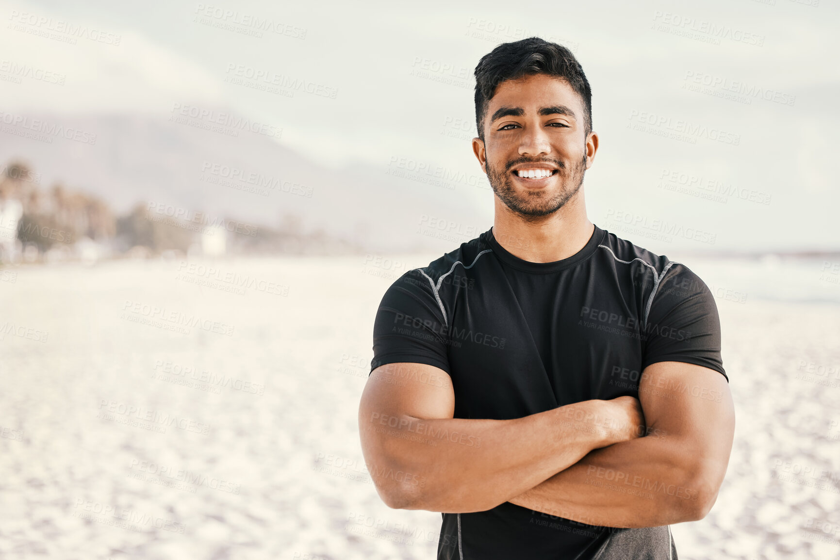 Buy stock photo Beach, man and portrait with arms crossed for fitness, exercise and running in morning for physical health. Seaside, male athlete or bodybuilder with pride for cardio, workout or sports by mockup