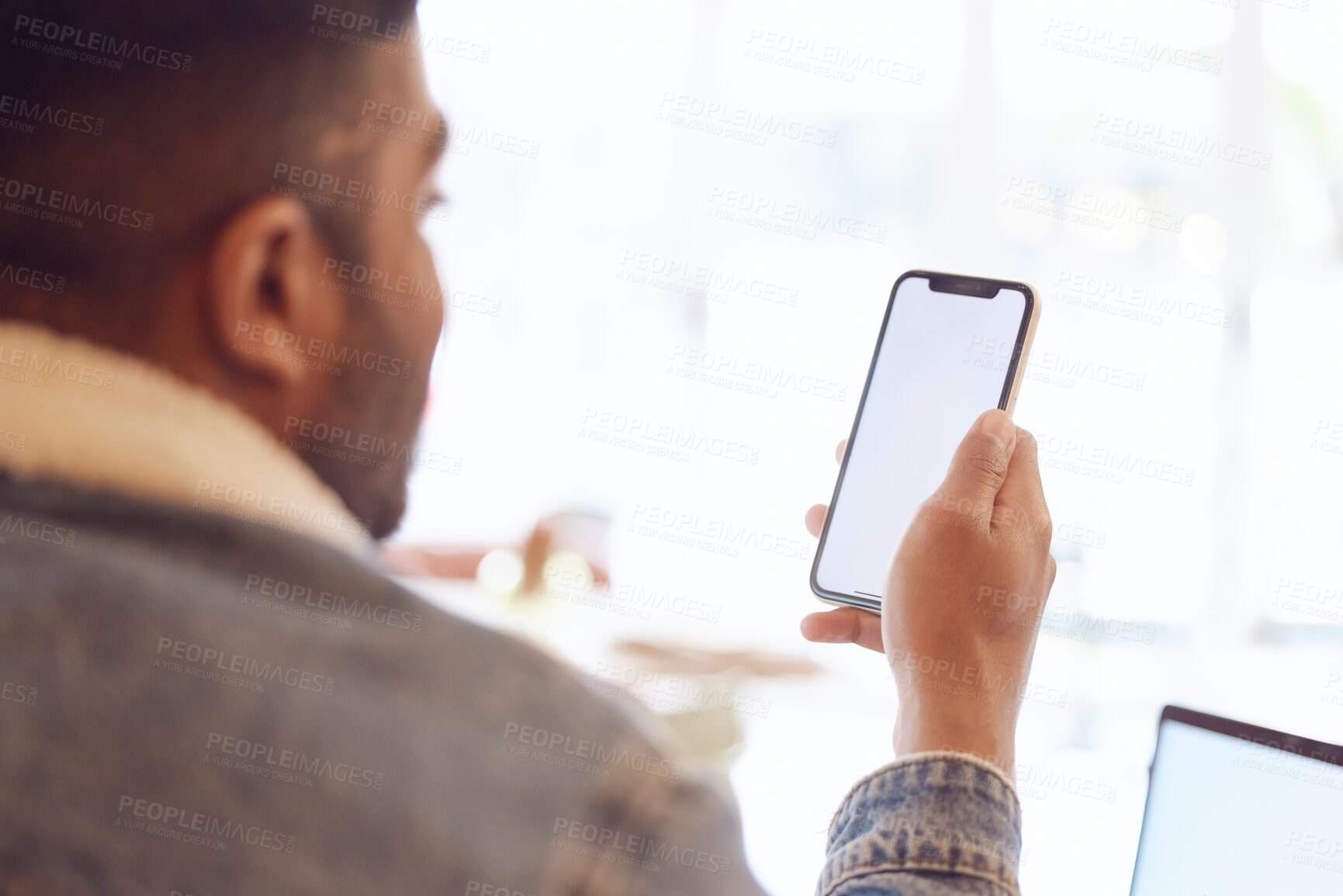 Buy stock photo Mockup space, cafe and man with smartphone, typing and relax with social media, texting and message. Person, mobile user in coffee shop and phone screen for internet with digital app and connection