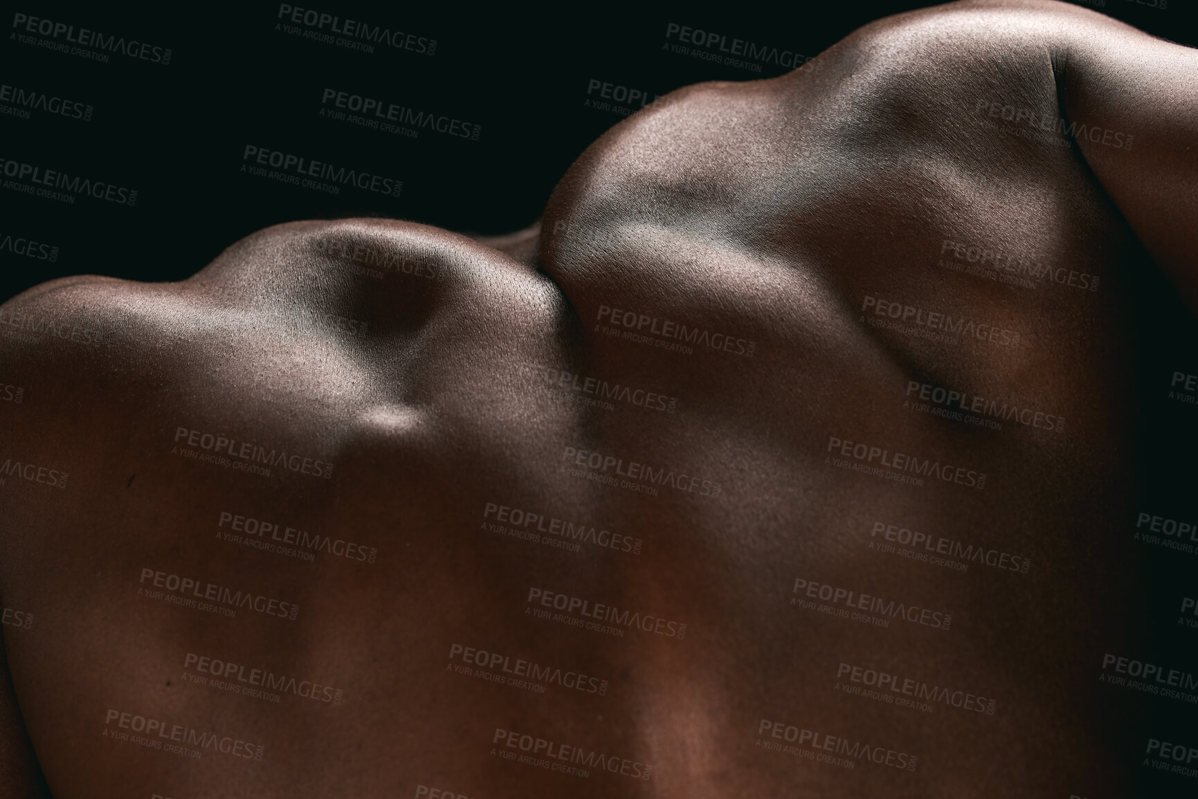 Buy stock photo Man, back and muscle in studio, flexing and skin texture for cosmetics or strong on black background. Male person, body care and bodybuilder for health or glow, dermatology and athlete for beauty