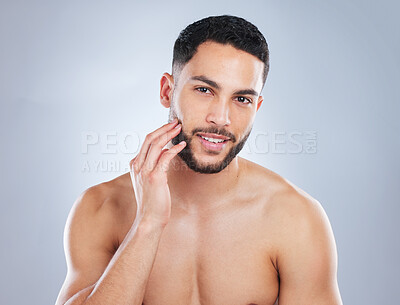 Buy stock photo Skincare, beauty and portrait of man in studio with wellness, cosmetics and facial treatment. Aesthetic, dermatology and face of person with healthy skin, confidence and glow on white background