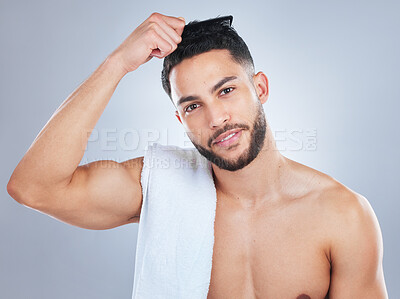 Buy stock photo Man, comb hair and studio portrait with smile for style, healthy growth or grooming routine by background. Person, model or happy for hairstyle, wellness or cotton cloth for cleaning scalp in morning