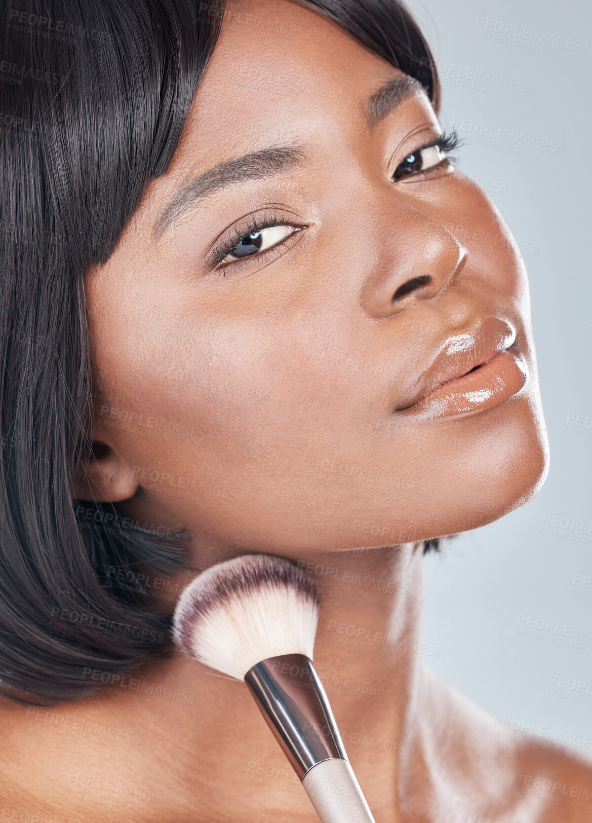 Buy stock photo Black woman, makeup brush and portrait in studio with beauty, change and foundation by background. Girl, person and glow with tools, cosmetics with product for facial skin with powder for aesthetic