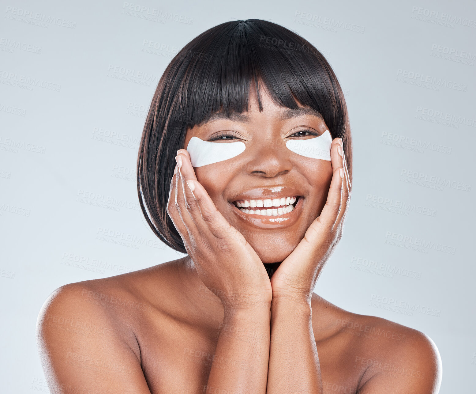 Buy stock photo Eye mask, beauty and black woman portrait with cosmetics, skincare and dermatology in studio. Wellness, youth serum and face cleaning with facial, skin glow and care with laughing and treatment