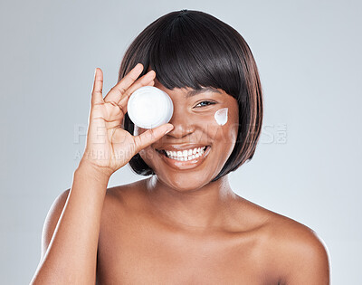 Buy stock photo Happy, portrait and black woman with container of cream for skincare or moisturizer on a white studio background. Face of African, female person or model with smile, lotion or spf for dermatology