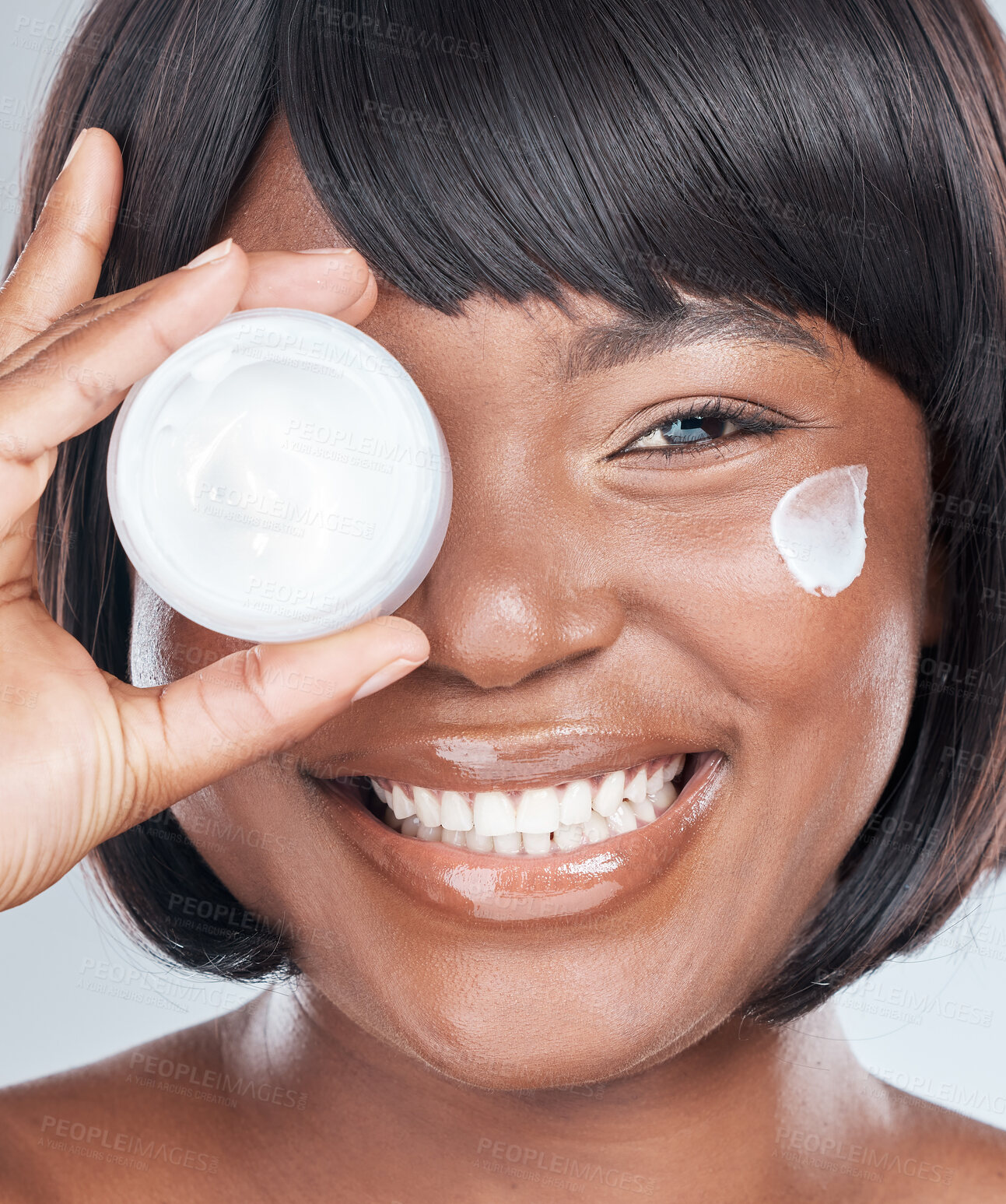 Buy stock photo Happy, portrait and black woman with cream container for skincare or moisturizer on a white studio background. Face of African, female person or model with smile and lotion for facial or dermatology