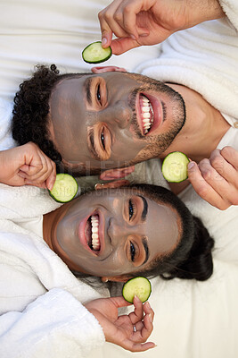 Buy stock photo Facial, spa and smile with portrait of couple for skincare, cosmetics and detox from above. Beauty, relax and self care with man and woman with clay mask at home for salon, wellness and cucumber 