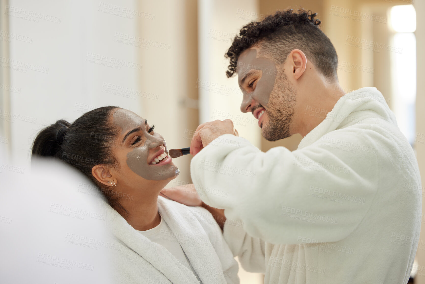 Buy stock photo Facial, spa and help with couple and mask for skincare, cosmetics and detox treatment. Beauty, relax and self care morning with man and woman in bathroom at home for salon, wellness and love