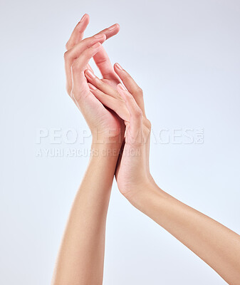 Buy stock photo Studio shot of an unrecognizable woman’s beautiful hands against a grey background
