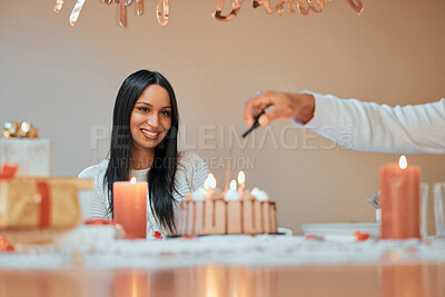 Buy stock photo Shot of a young couple celebrating a birthday at home