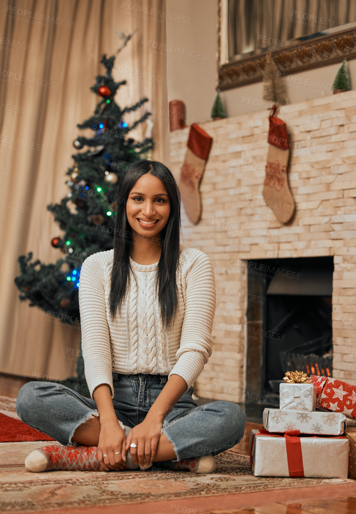 Buy stock photo Portrait of a young woman celebrating Christmas at home