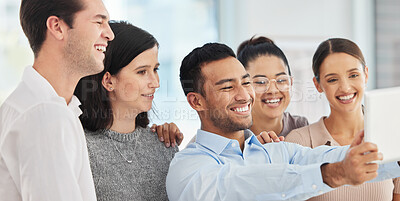 Buy stock photo Shot of a group of business people taking a selfie using a digital tablet