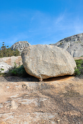 Buy stock photo Big rocks on a mountain with a blue sky background and copy space. Large stones with beautiful rough texture details on a sunny day. Closeup outdoor nature landscape of boulders on a rocky hill