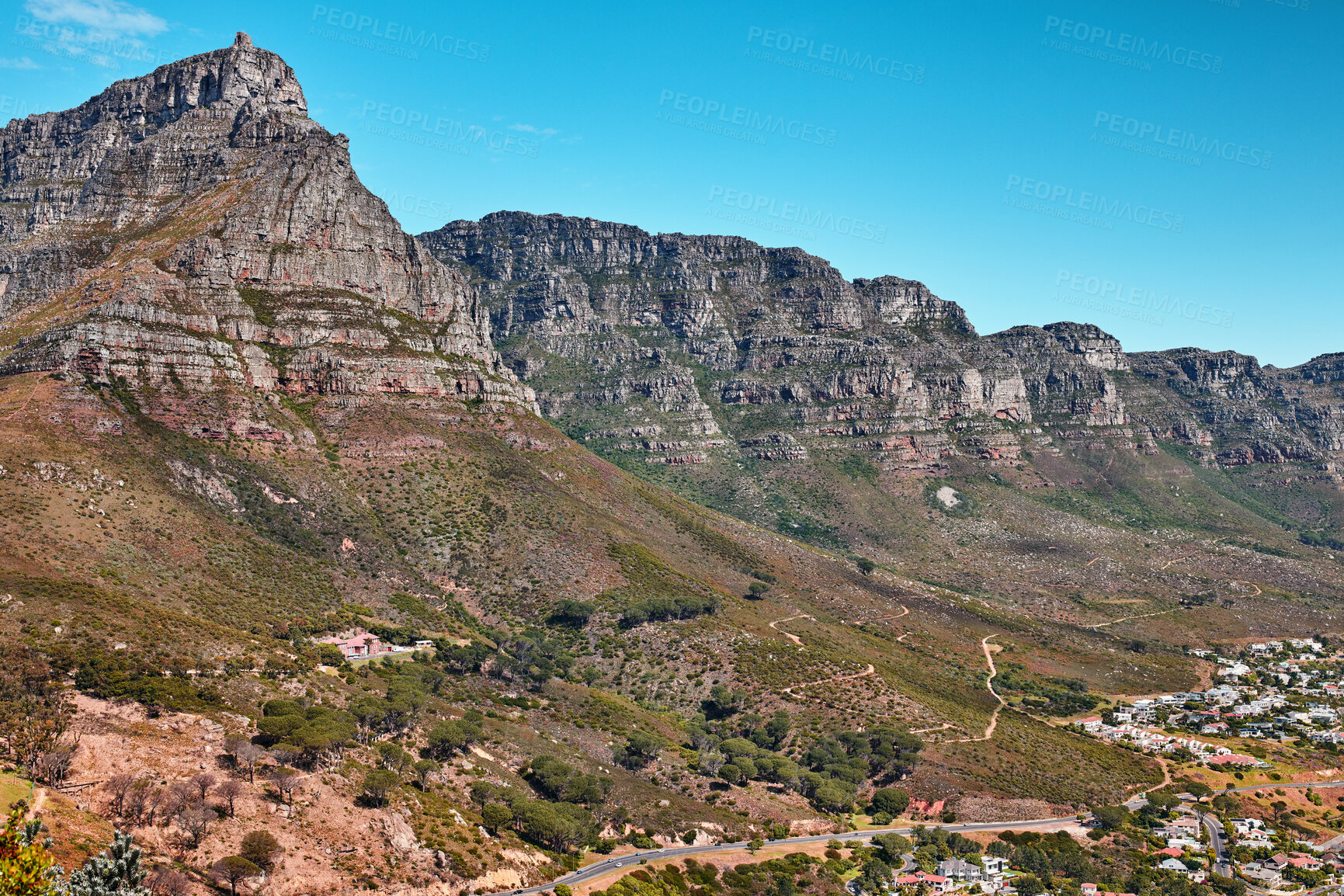 Buy stock photo Beautiful, relaxing and calming panoramic view of Table mountain in Cape Town, South Africa. Banner of lush green bushes and trees growing on rocky peaks with trails and scenic views of the city