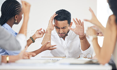 Buy stock photo Shot of a businessman experiencing a headache during a meeting