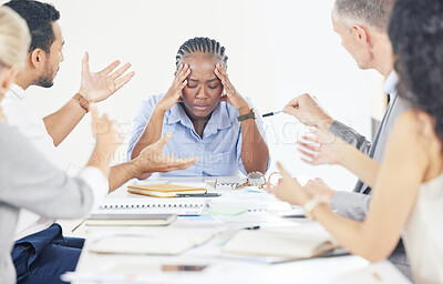 Buy stock photo Shot of a businesswoman experiencing a headache during a meeting