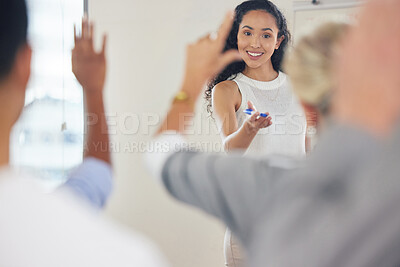 Buy stock photo Shot of a young businesswoman answering questions during a presentation