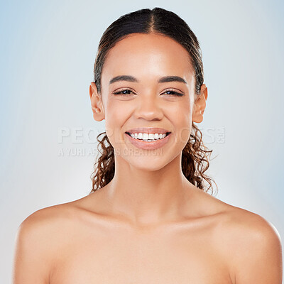 Buy stock photo Portrait, skincare and beauty of happy woman in studio for glow, shine or health isolated on blue background. Face, smile and model in makeup for cosmetics, dermatology and wellness for aesthetic