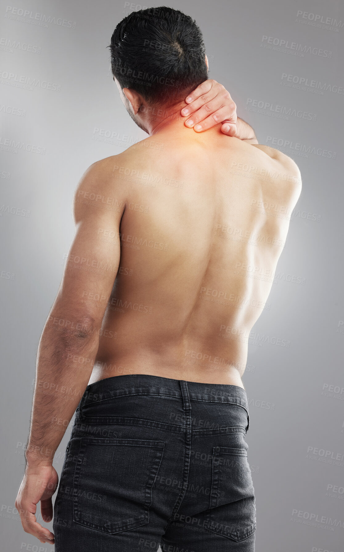 Buy stock photo Studio shot of a muscular unrecognizable man experiencing neck pain against a grey background
