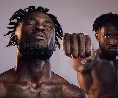 Buy stock photo Shot of two men fighting in studio against a grey background