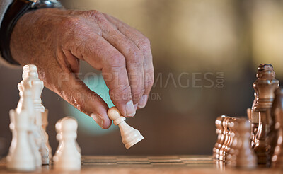 Buy stock photo Cropped shot of an unrecognisable man playing a game of chess