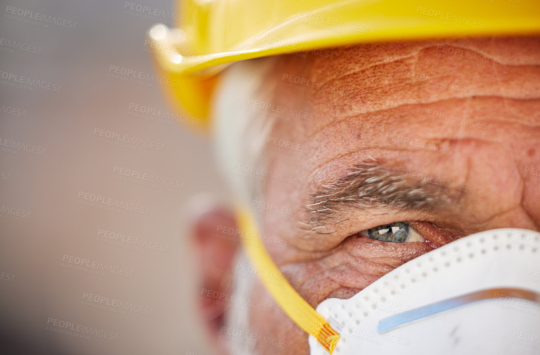 Buy stock photo Cropped shot of a senior man wearing a hard hat and mask