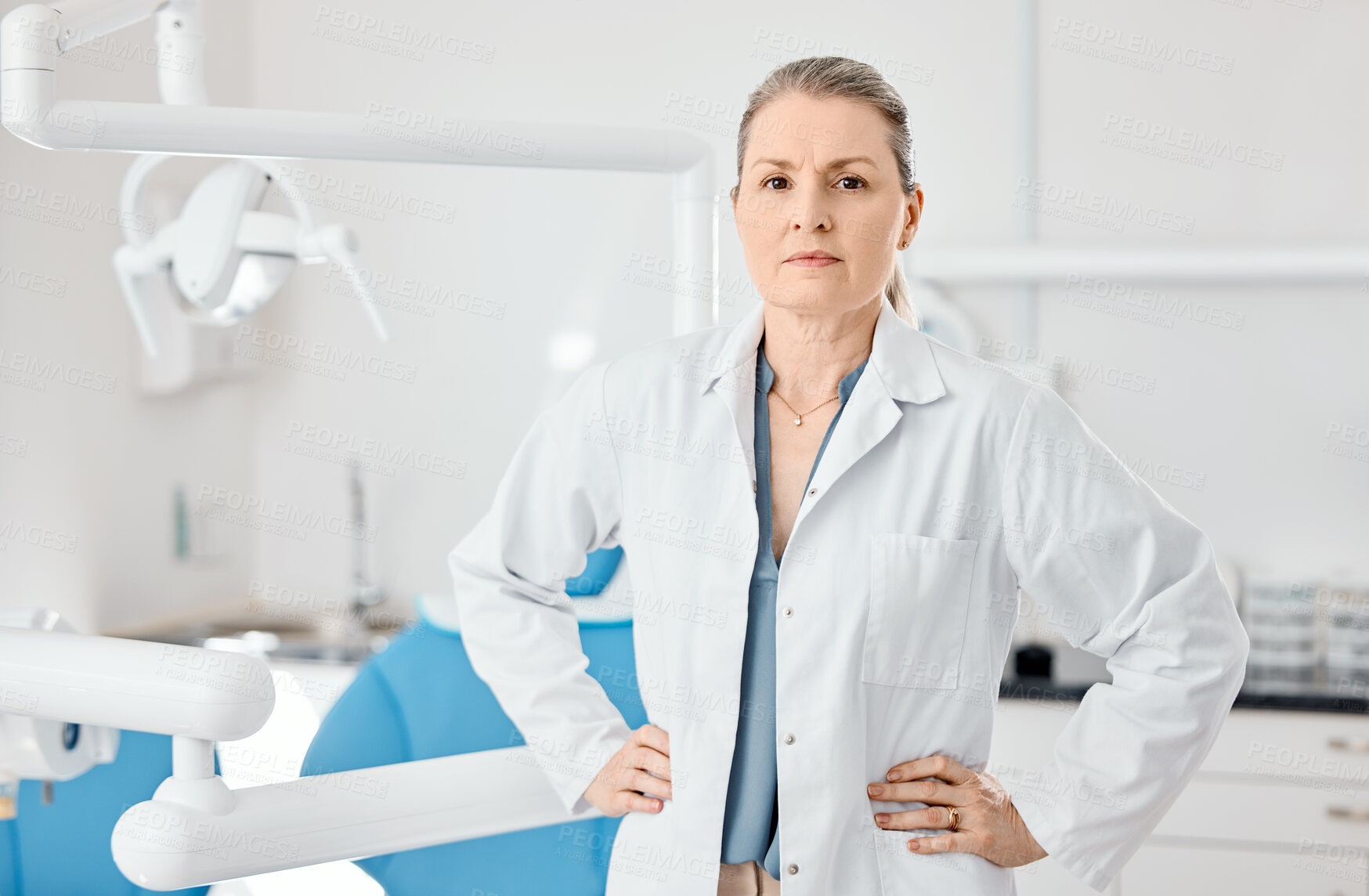 Buy stock photo Shot of mature female dentist in her office