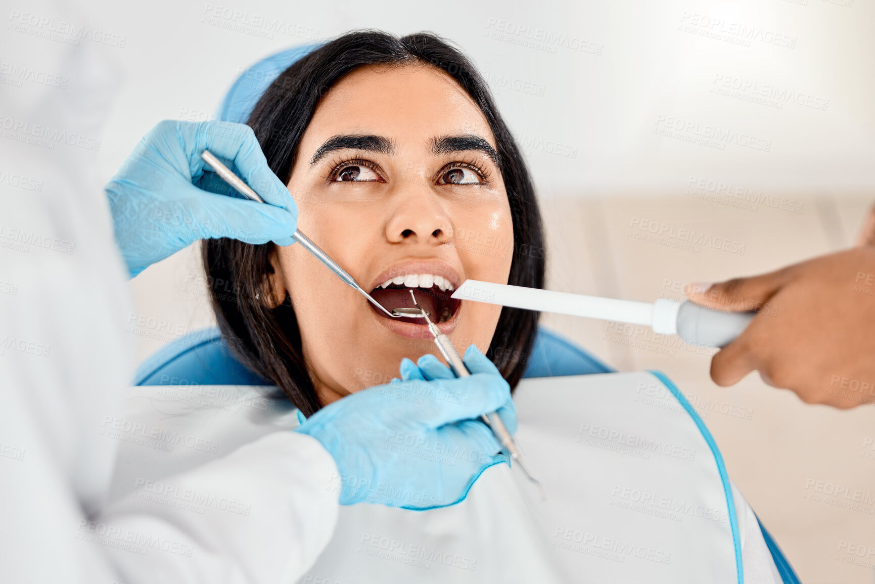 Buy stock photo Dentist, woman and patient at a clinic with medical and healthcare for teeth whitening. Mirror, orthodontist and female person with wellness and dental work tool in mouth with care and cleaning