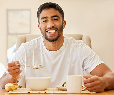 Buy stock photo Morning, happy and breakfast with portrait of man at table for wake up, nutrition and food. Relax, wellness and detox diet with male person eating muesli cereal at home for health, weekend and energy