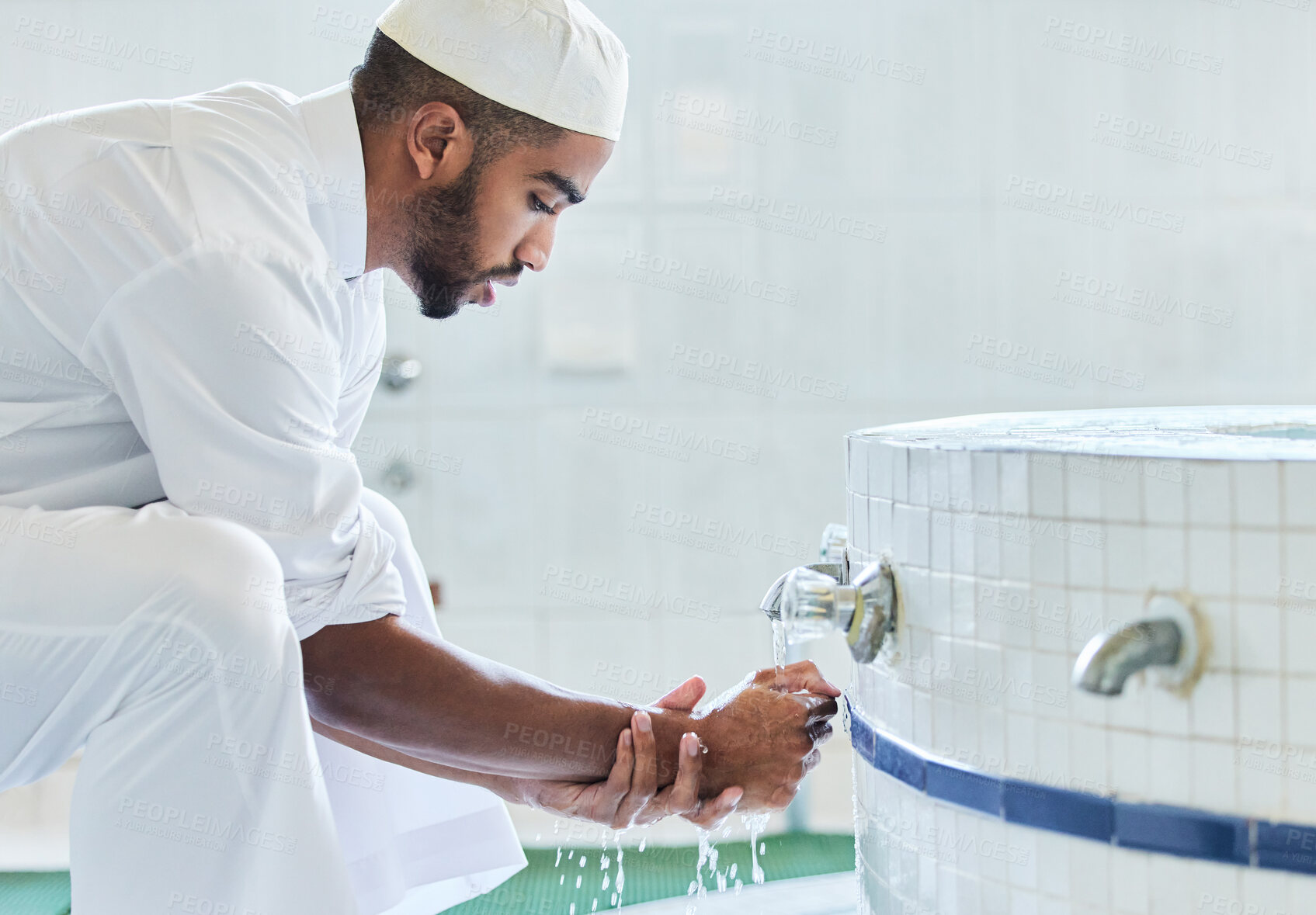 Buy stock photo Washing hands, muslim and man with cleaning tradition in bathroom for religion and prayer routine. Islamic, spiritual and eid with culture and wellness in mosque for ramadan and respoect for faith