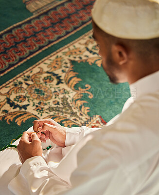 Buy stock photo Shot of a unrecognizable muslim male praying in a mosque