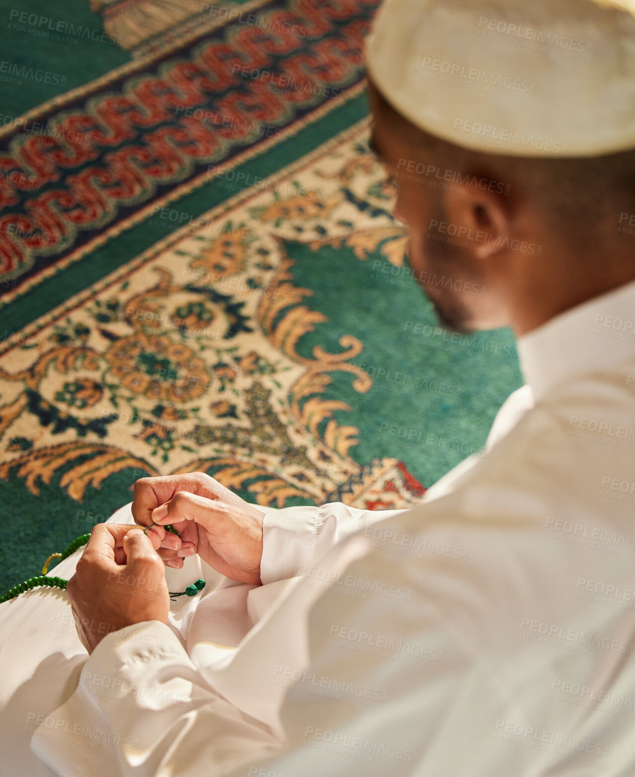 Buy stock photo Muslim, prayer and man in mosque with tasbih in hands for spiritual worship of God in temple. Person, praying and respect for religion of Islam or gratitude for holy faith or islamic culture closeup