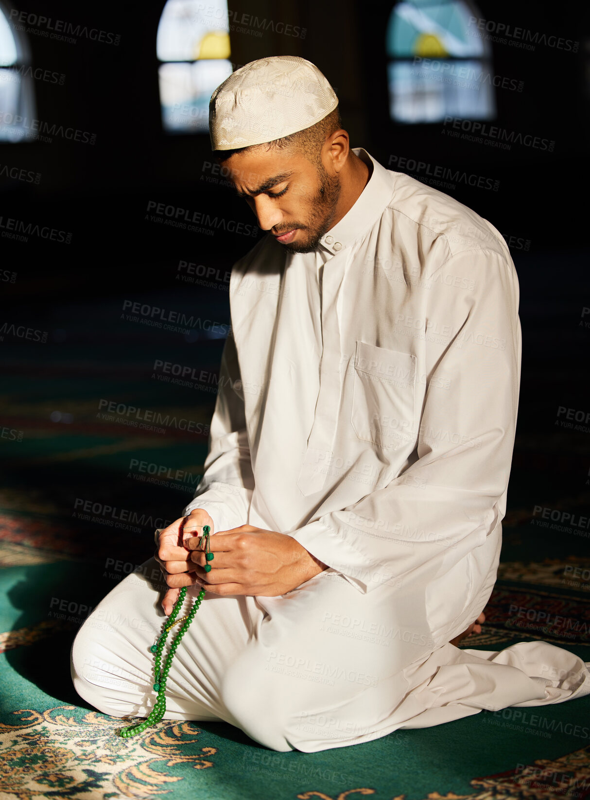 Buy stock photo Muslim, praying and spiritual man in mosque for worship of God, Allah and mindfulness in temple. Tasbih, prayer and respect for religion of Islam in meditation of gratitude for holy faith and peace