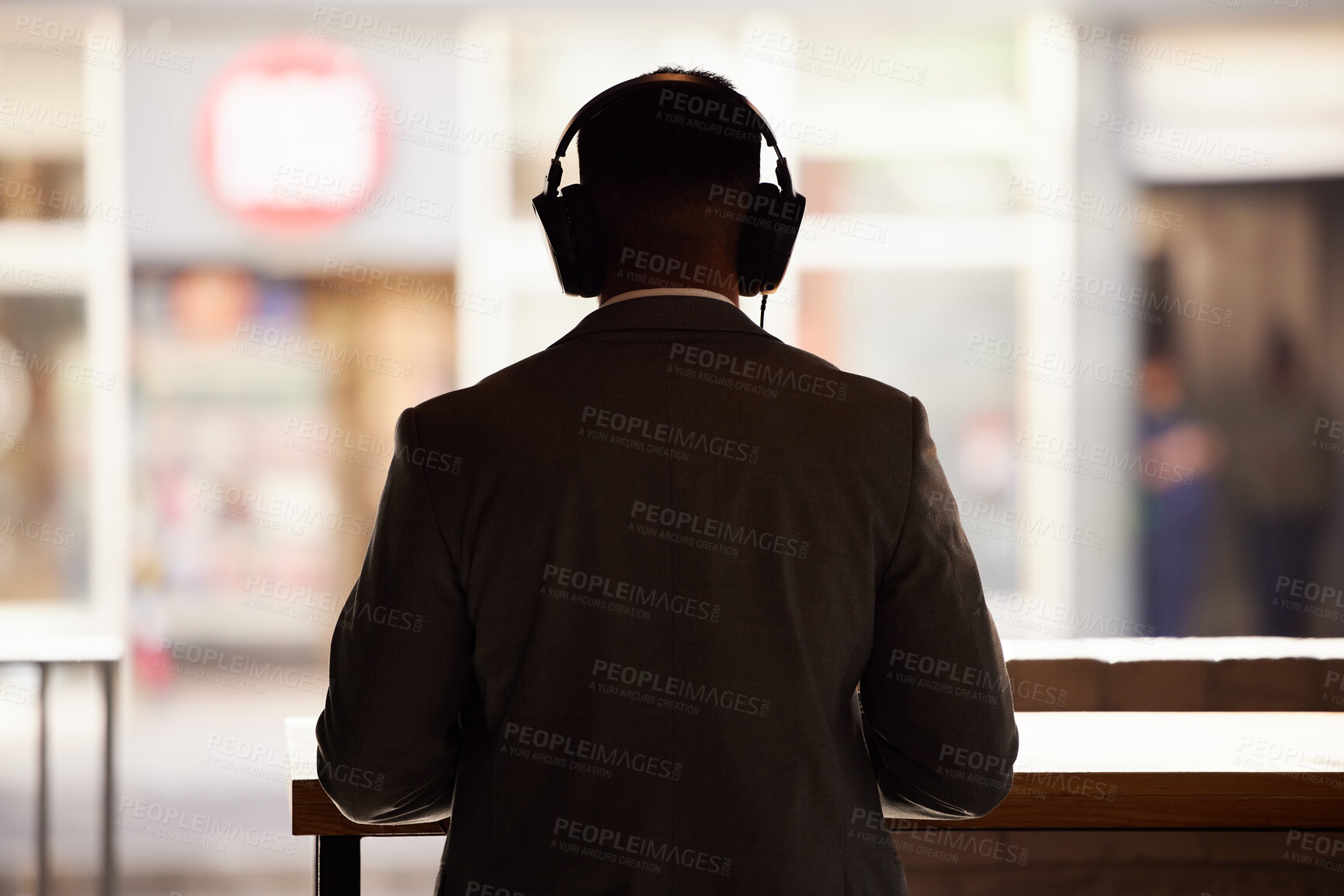 Buy stock photo Cafe, music and businessman with headphones at restaurant for listening, streaming or audio. Male person, back and earphones at table with technology for digital radio, online network or break in job