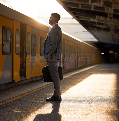 Buy stock photo Businessman, travel and waiting for train with face mask for public transport, journey and protection. Professional person, briefcase and ppe with thinking for commute, safety or morning trip to work