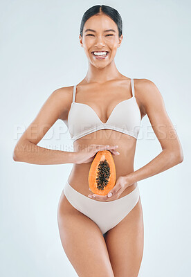 Buy stock photo Health, fruit and nutrition for woman or diet, food and balance on white background. Weight loss, papaya and vitamins or vegan for fibre and wellness, benefits and studio and portrait of female model