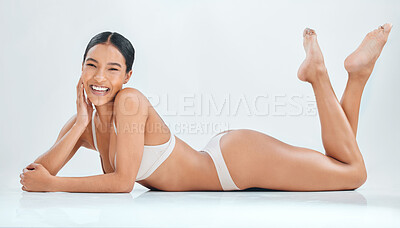 Buy stock photo Underwear, beauty and body with portrait of woman in studio for hair removal, skincare and cosmetics. Self care, glow and happy with female model on white background for wellness, natural and shine